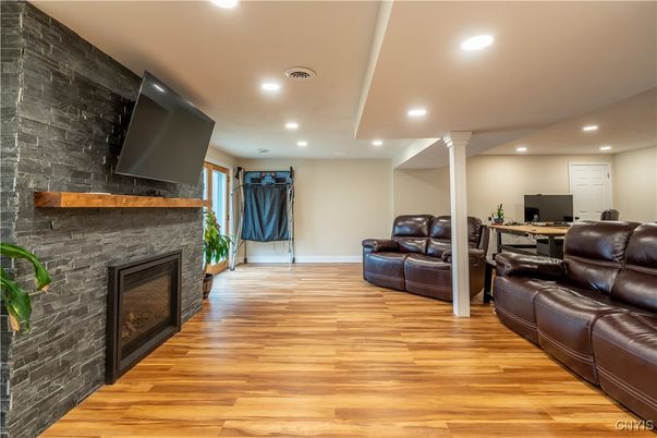 Fireplace, Home Office, Interior, Recessed Lighting, Stone Walls, Wood Texture Flooring