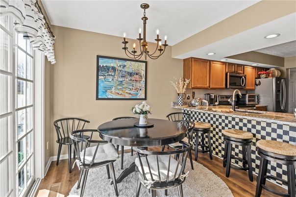 Chandelier, Dining room, Interior, Kitchen, Recessed Lighting, Stainless Steel Appliances, Wood Texture Flooring