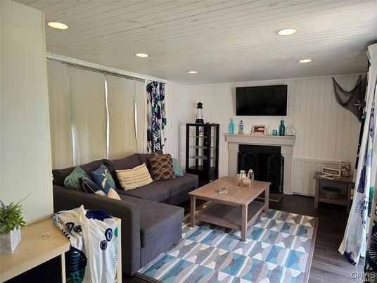 Fireplace, Interior, Living room, Recessed Lighting, Wood Texture Flooring