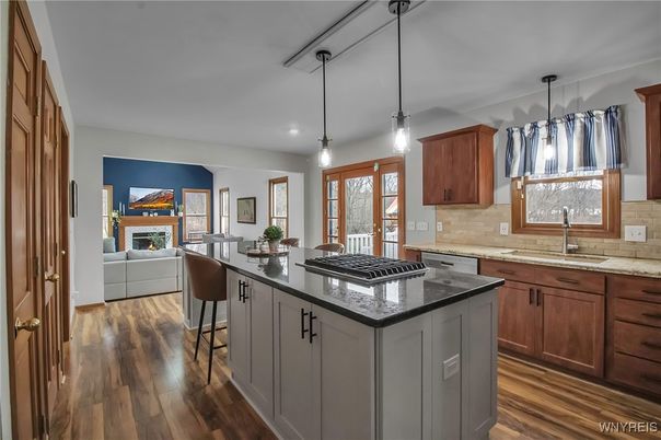 Dining room, Fireplace, Interior, Kitchen, Living room, Pendant Lights, Wood Texture Flooring