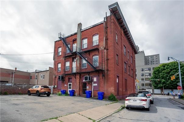 Exterior, Facade, Brick Facade, Condo Building