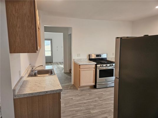 Interior, Kitchen, Recessed Lighting, Stainless Steel Appliances, Wood Texture Flooring