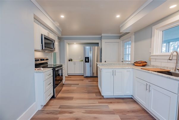 Interior, Kitchen, Recessed Lighting, Stainless Steel Appliances, Wood Texture Flooring