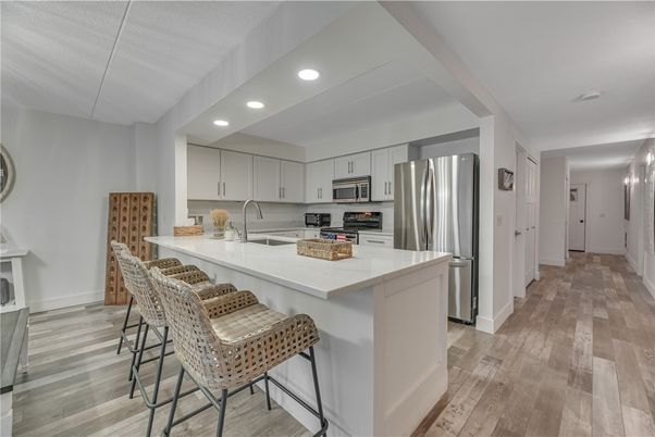 Interior, Kitchen, Recessed Lighting, Stainless Steel Appliances, Wood Texture Flooring