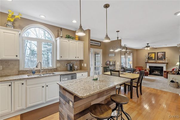 Dining room, Fireplace, Interior, Kitchen, Living room, Pendant Lights, Recessed Lighting, Wood Texture Flooring