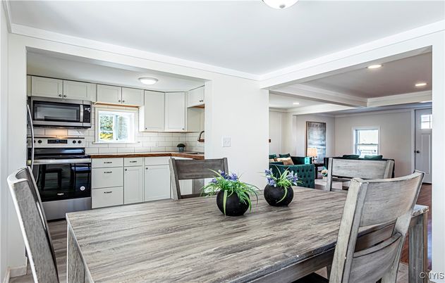Dining room, Interior, Kitchen, Living room, Recessed Lighting, Stainless Steel Appliances, Wood Texture Flooring