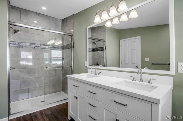 Bathroom, Dual Sink Vanities, Glass Shower, Interior, Recessed Lighting, Wood Texture Flooring