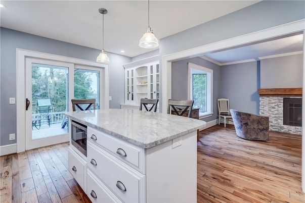 Dining room, Fireplace, Interior, Kitchen, Pendant Lights, Recessed Lighting, Wood Texture Flooring