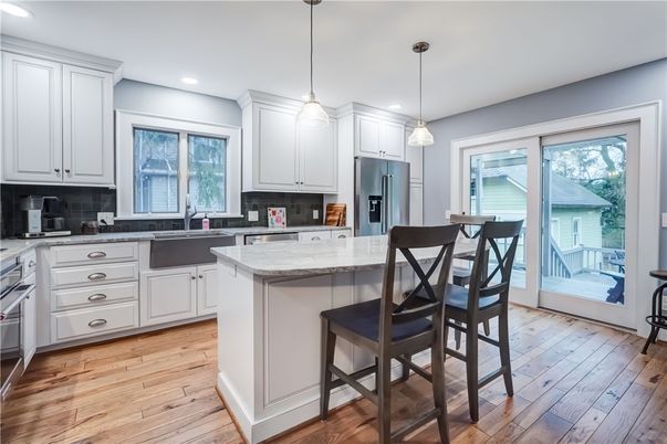 Interior, Kitchen, Pendant Lights, Recessed Lighting, Stainless Steel Appliances, Wood Texture Flooring