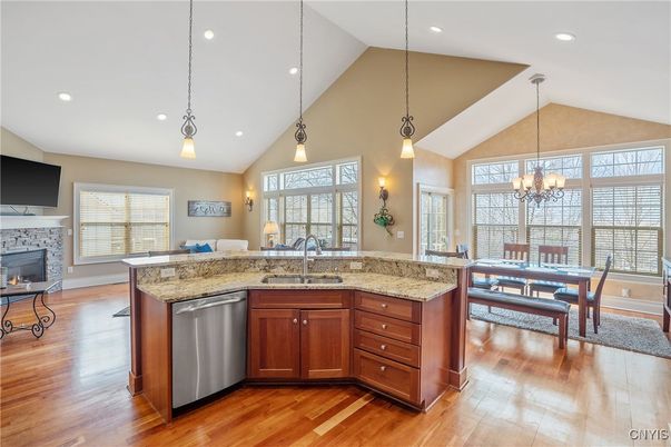 Chandelier, Dining room, Fireplace, Interior, Kitchen, Pendant Lights, Recessed Lighting, Wood Texture Flooring