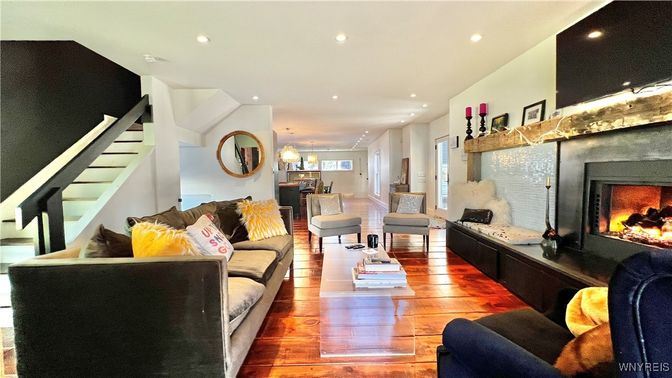 Dining room, Fireplace, Interior, Living room, Pendant Lights, Recessed Lighting, Wood Texture Flooring
