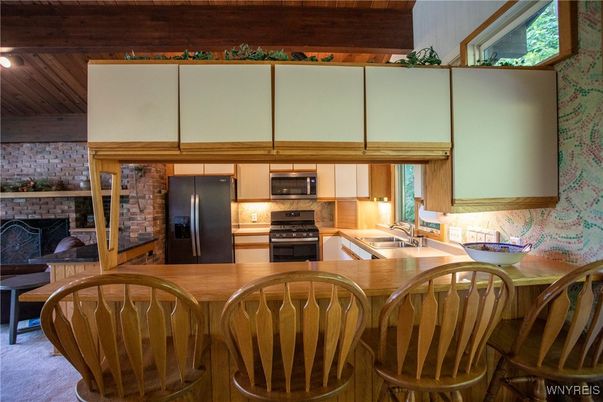 Fireplace, Interior, Kitchen, Stainless Steel Appliances, Stone Walls, Wooden Beams, Wooden Ceilings