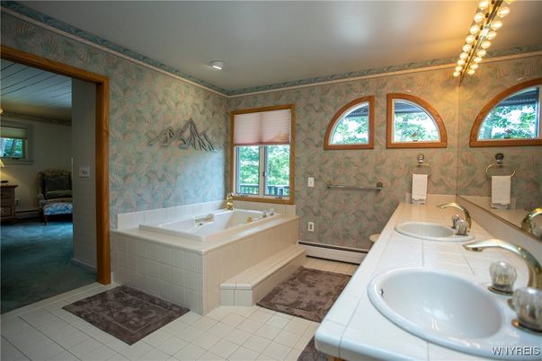 Bathroom, Dual Sink Vanities, Interior, Recessed Lighting, Tile Countertops