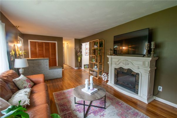 Fireplace, Interior, Living room, Pendant Lights, Wood Texture Flooring