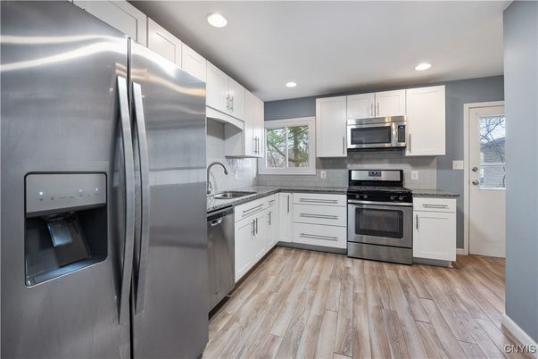 Interior, Kitchen, Recessed Lighting, Stainless Steel Appliances, Wood Texture Flooring