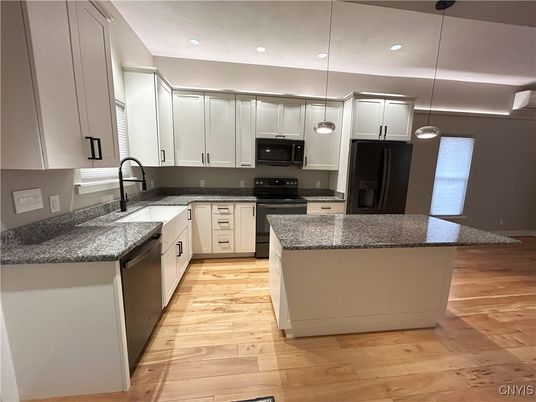 Interior, Kitchen, Pendant Lights, Recessed Lighting, Stainless Steel Appliances, Wood Texture Flooring