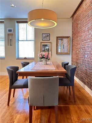 Dining room, Interior, Pendant Lights, Stone Walls, Wood Texture Flooring
