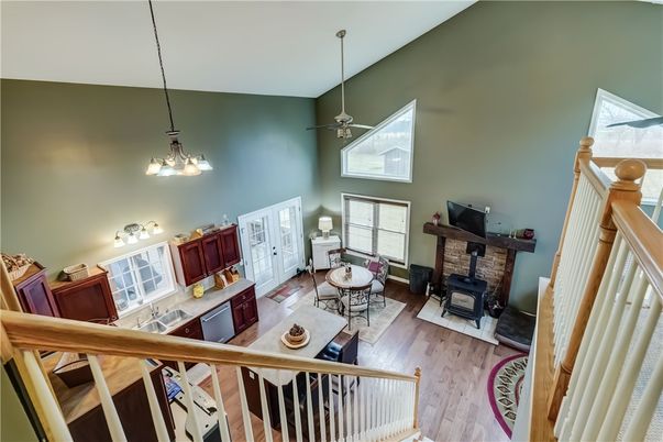 Fireplace, Interior, Living room, Pendant Lights, Stone Walls, Wood Texture Flooring