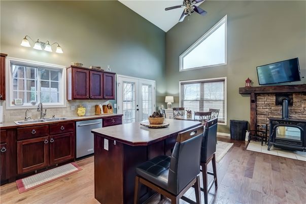 Dining room, Fireplace, Interior, Kitchen, Stone Walls, Wood Texture Flooring