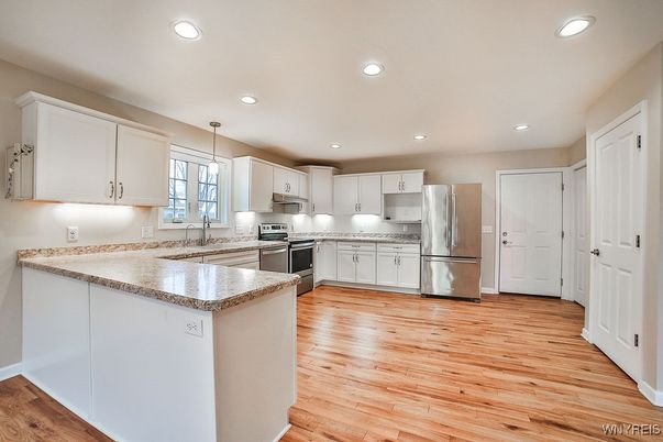 Interior, Kitchen, Pendant Lights, Recessed Lighting, Stainless Steel Appliances, Wood Texture Flooring