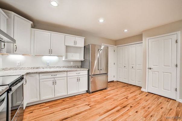 Interior, Kitchen, Recessed Lighting, Stainless Steel Appliances, Wood Texture Flooring