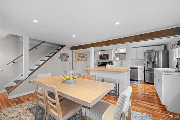 Dining room, Interior, Kitchen, Pendant Lights, Recessed Lighting, Stainless Steel Appliances, Wood Texture Flooring