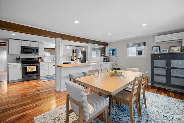 Dining room, Interior, Kitchen, Pendant Lights, Recessed Lighting, Stainless Steel Appliances, Wood Texture Flooring