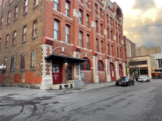 Exterior, Facade, Brick Facade, Condo Building