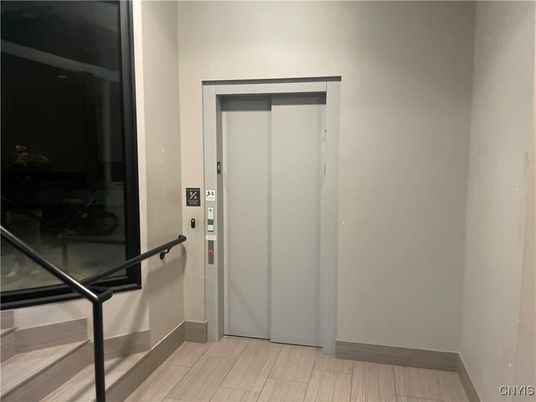 Elevator, Interior, Wood Texture Flooring