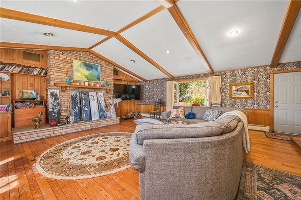Fireplace, Interior, Living room, Recessed Lighting, Stone Walls, Wooden Beams, Wood Texture Flooring
