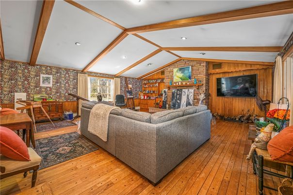 Fireplace, Interior, Living room, Recessed Lighting, Stone Walls, Wooden Beams, Wood Texture Flooring