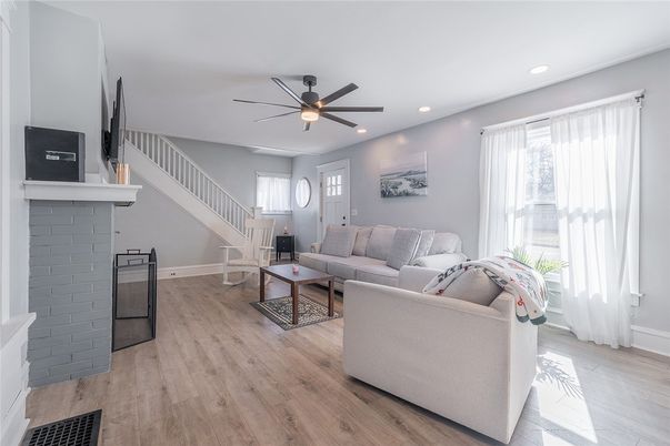 Fireplace, Interior, Living room, Recessed Lighting, Wood Texture Flooring