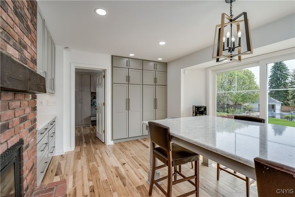 Dining room, Fireplace, Interior, Kitchen, Pendant Lights, Recessed Lighting, Stone Walls, Wood Texture Flooring
