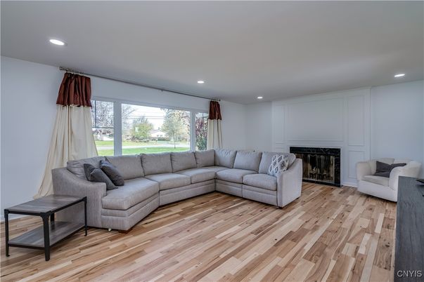 Fireplace, Interior, Living room, Recessed Lighting, Wood Texture Flooring