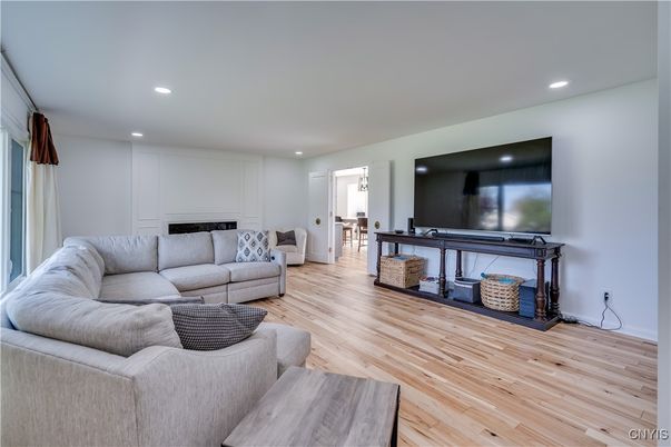 Fireplace, Interior, Living room, Recessed Lighting, Wood Texture Flooring