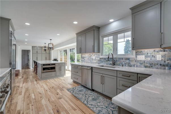 Chandelier, Interior, Kitchen, Pendant Lights, Recessed Lighting, Stainless Steel Appliances, Wood Texture Flooring
