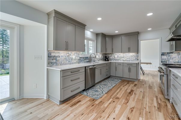 Interior, Kitchen, Recessed Lighting, Stainless Steel Appliances, Wood Texture Flooring