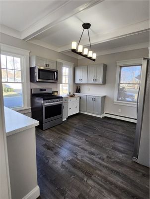 Chandelier, Interior, Kitchen, Pendant Lights, Stainless Steel Appliances, Wood Texture Flooring