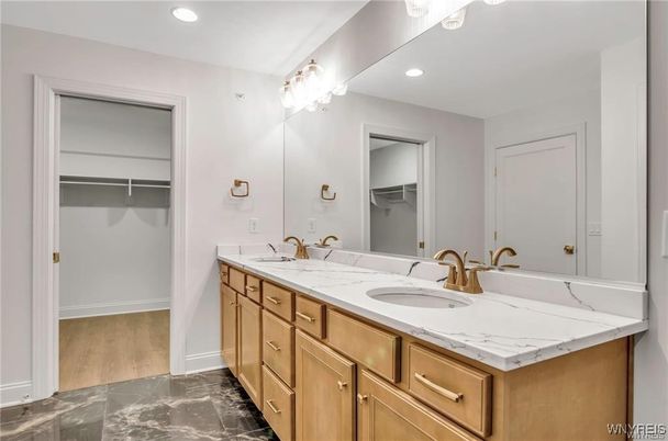 Bathroom, Dual Sink Vanities, Interior, Recessed Lighting, Walk-in Closets, Wood Texture Flooring