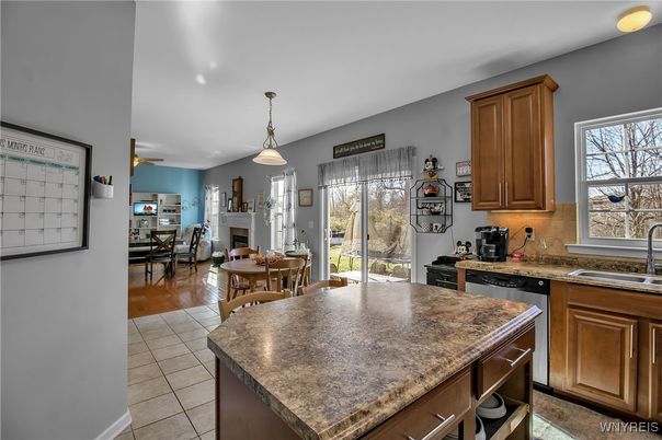 Dining room, Fireplace, Interior, Kitchen, Living room, Pendant Lights, Wood Texture Flooring