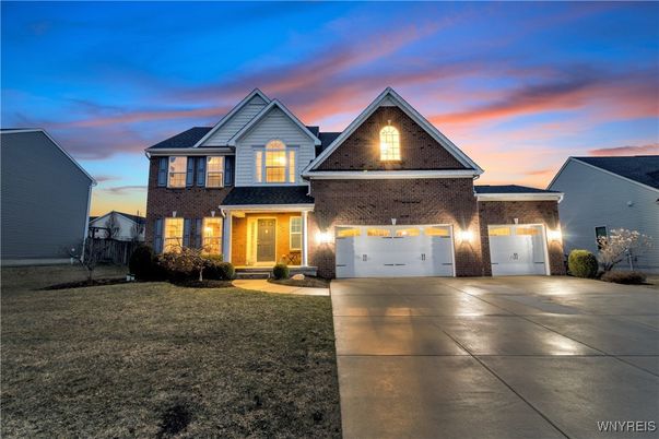 Attached, Exterior, Facade, Brick Traditional