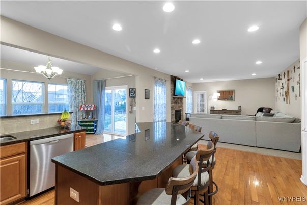 Dining room, Interior, Kitchen, Living room, Recessed Lighting, Stainless Steel Appliances, Wood Texture Flooring