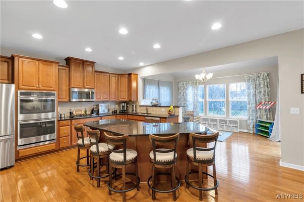 Chandelier, Interior, Kitchen, Recessed Lighting, Stainless Steel Appliances, Wood Texture Flooring