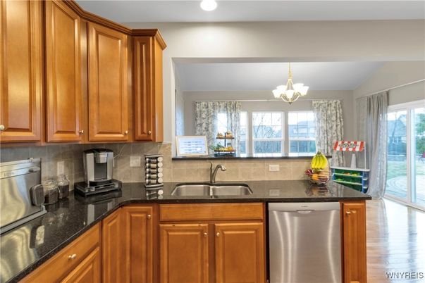 Chandelier, Interior, Kitchen, Recessed Lighting, Stainless Steel Appliances, Wood Texture Flooring