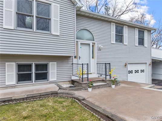 Attached, Exterior, Facade, Raised Ranch