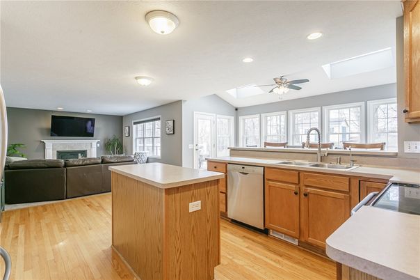 Fireplace, Interior, Kitchen, Living room, Recessed Lighting, Wood Texture Flooring