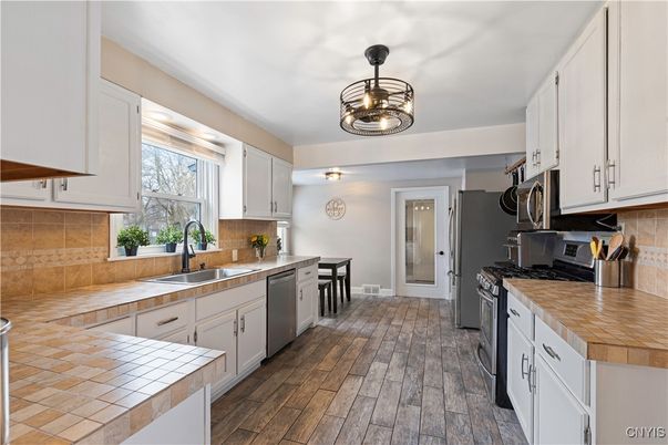 Interior, Kitchen, Tile Countertops, Wood Texture Flooring