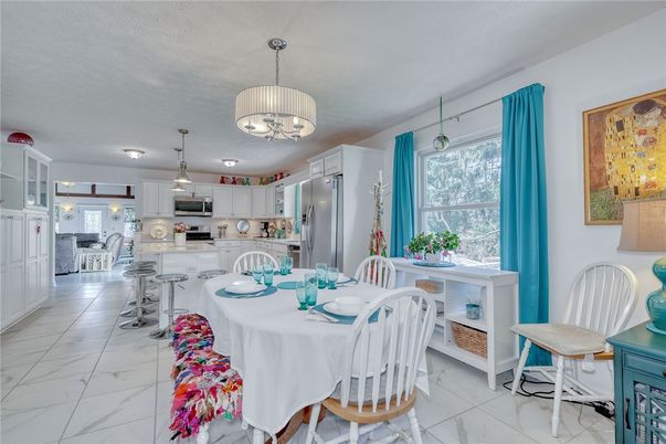 Dining room, Interior, Kitchen, Marble, Pendant Lights, Stainless Steel Appliances