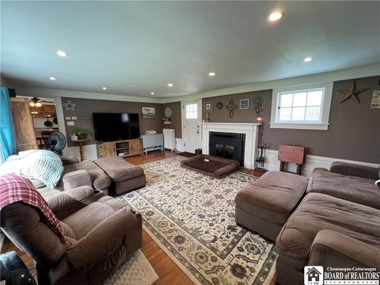 Fireplace, Interior, Living room, Recessed Lighting, Wood Texture Flooring