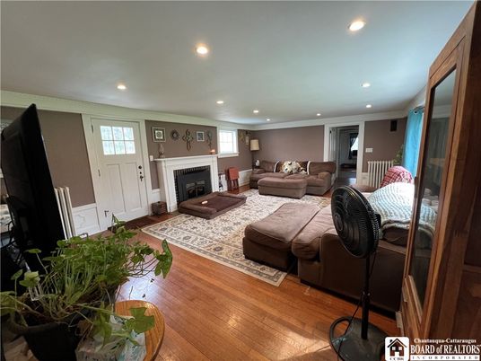 Fireplace, Interior, Living room, Recessed Lighting, Wood Texture Flooring